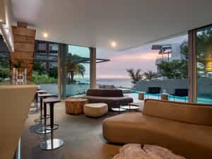 Lounge, bar and pool area overlooking Camps Bay beach