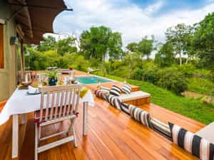 Plunge pool with views of the Sand River