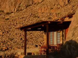 Each of the natural rock chalets sits between massive granite boulders and contains a bathroom, kitchenette, fireplace and private veranda.