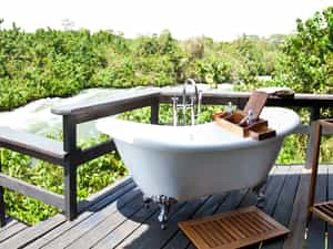 All Villa suites have a bath on the outside deck overlooking the Nile