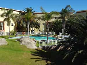 VERDANT GARDENS & SPARKLING POOLS