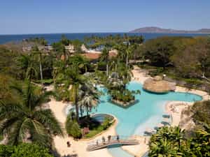 Our family-friendly lagoon-shaped pool, nestled among a stunning tropical garden environment and pre-Columbian sculptures, offers you a lot of fun.
