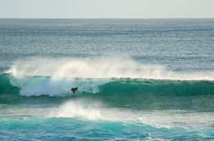 Catch a wave surfing off Easter island