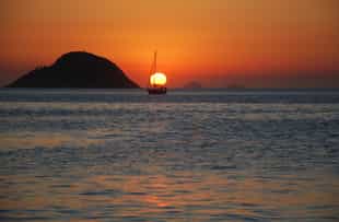 Enjoy the sunset while touring around Itaipu Lake