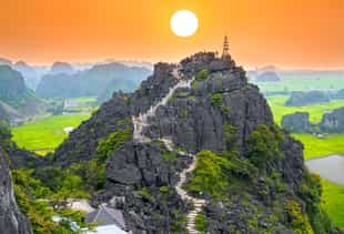 Climb the 500 steps to the Mua Cave viewpoint