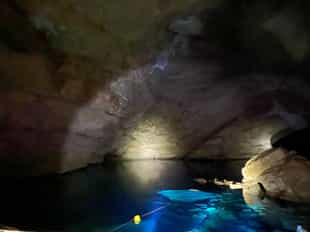 Go on a Cave tubing & Zipline tour