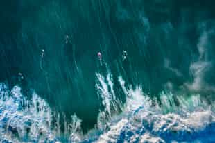Take on the waves on a surfing lesson in Nusa Dua