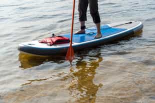 Go stand up paddleboarding in Zandvlei Estuary