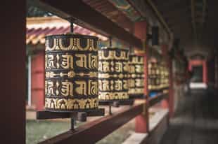 Visit the Kanha temple to understand their beliefs