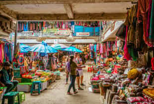 Explore the bustling Ubud markets on foot