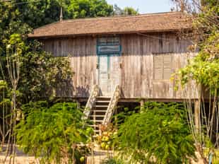 Enjoy a picnic lunch served in a Khmer cottage 