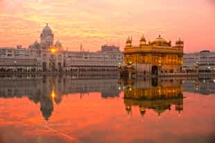 Witness the Palki Sahib ceremony at the Golden Temple