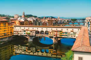 Walk across the iconic Ponte Vecchio, Florence