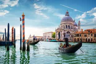 Explore Venice's canals on a gondola ride