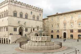 Marvel at the Fontana Maggiore in Perugia