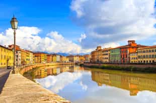 Stroll along the picturesque Lungarno in Pisa