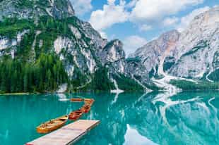 Take in serene lake views in the Dolomites
