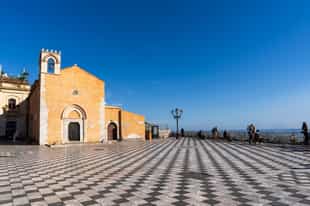 See panoramic views at Piazza IX Aprile, Taormina