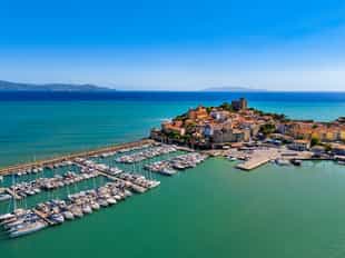 Take a boat trip along the coast of Maremma
