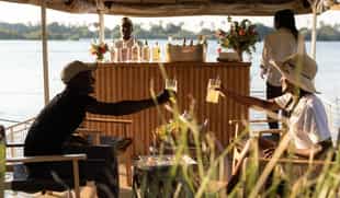 Go on a private sunset cruise aboard the Kalunda