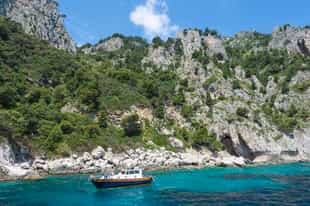 Swim and snorkel Capri's coast by gozzo