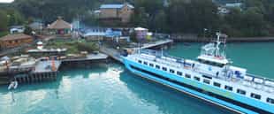 Take a ferry from Puerto Yunga to Puerto Natales
