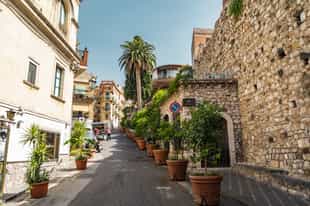 Walk through Taormina’s enchanting upper town