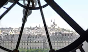 Paris views through the Musee d'Orsay clock