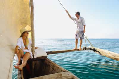 Sail out and snorkel the clear waters of Msambweni
