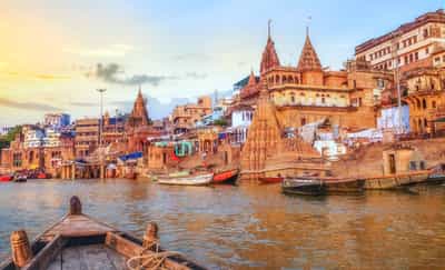 Go on a boat ride at the Assi Ghat in Varanasi