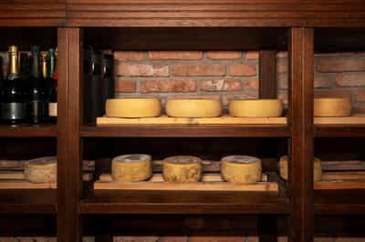 Taste cheese and wine in a Paris cellar