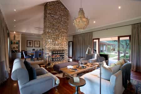 The welcoming U-shape with four ensuite bedrooms are cleverly designed around the central courtyard and its large, inviting swimming pool