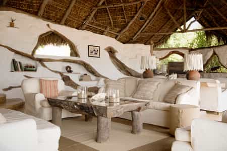 Perched on the banks of the Rufiji River, the main lounge is the perfect place to enjoy watching lazy hippos and crocs with a good book to keep you company.