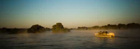 Explore the Upper Zambezi and surrounding Islands on an early morning Sunrise Boat Cruise