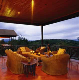 Sundowner drinks at one of the Veranda's of Pakamisa Lodge