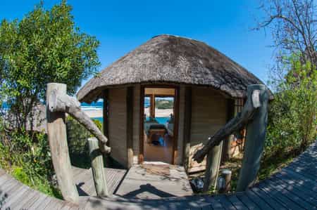 Nestled high on the Umngazi hillside the resort spa is tranquil and tastefully decorated, and guests are welcomed with a great Pondo smile. The spa offers three private and tranquil treatment rooms, each with an adjoining secluded spa bath and breathtaking panoramic views of the Indian Ocean where guests can enjoy a selection of four different types of spa bathing rituals while watching the whales and dolphins play in the surf.