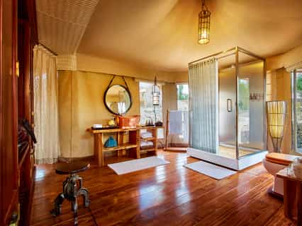 En-suite bathroom, Shower cubicle, Round-the-clock hot and cold water, Hair dryer and shaver socket, Custom-made bedroom slippers, eye masks, and earplugs, Custom-made bath accessories