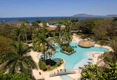 Our family-friendly lagoon-shaped pool, nestled among a stunning tropical garden environment and pre-Columbian sculptures, offers you a lot of fun.