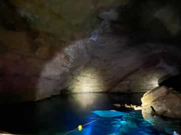 Go on a Cave tubing & Zipline tour